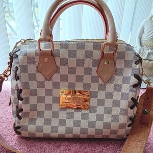 CHECKERED BAG WITH LEATHER DETAILING AND STRAP